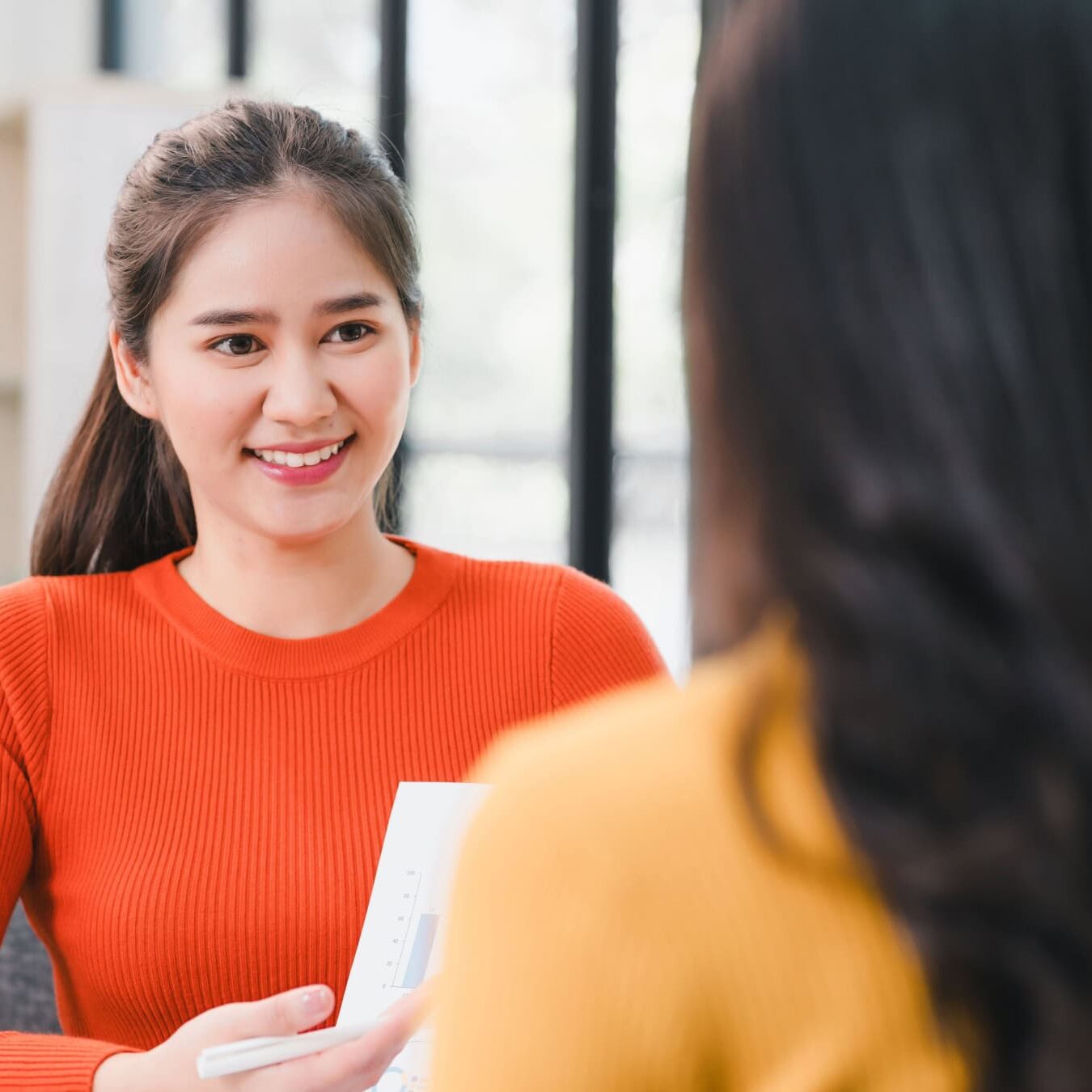 icf-credentialing-mentor-coaching-competencies A woman mentors another woman coach.