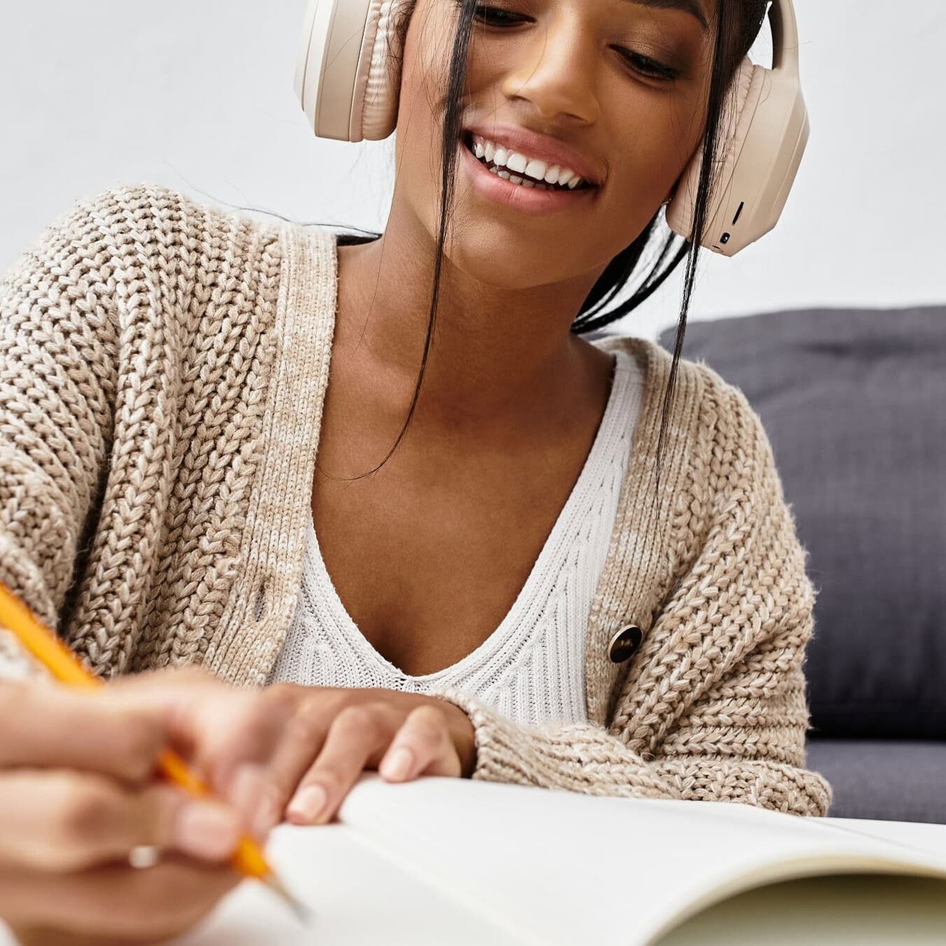 icf-resources-academic-research A woman reviews the literature reviews from the ICF Academic research at home